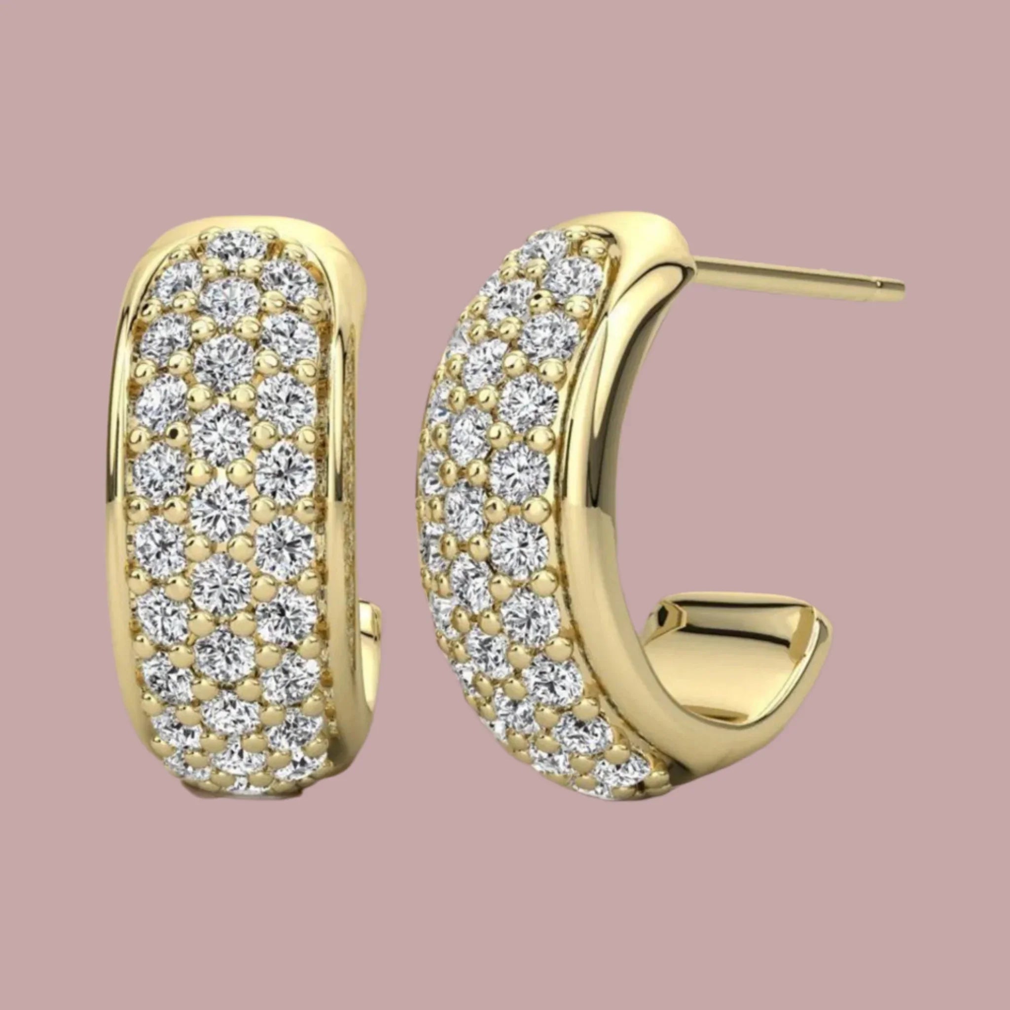 Eksklusive diamant creoler i 14 karat guld med 56 brillanter. Top Crystal VS kvalitet med pavéindfatning. Made to order.