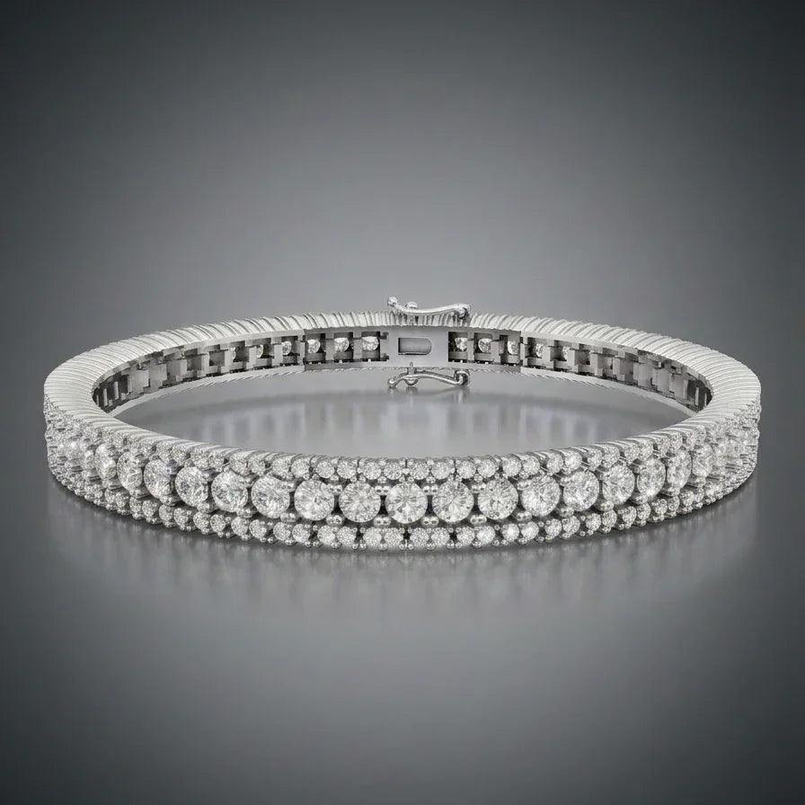 TENNISARMBÅND I 18 KT GULGULD MED 5,50 CT. HVIDE BRILLANTER