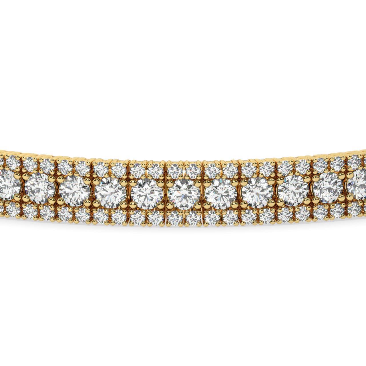 TENNISARMBÅND I 18 KT GULGULD MED 5,50 CT. HVIDE BRILLANTER