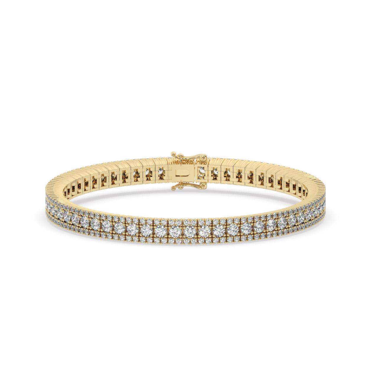 TENNISARMBÅND I 18 KT GULGULD MED 5,50 CT. HVIDE BRILLANTER