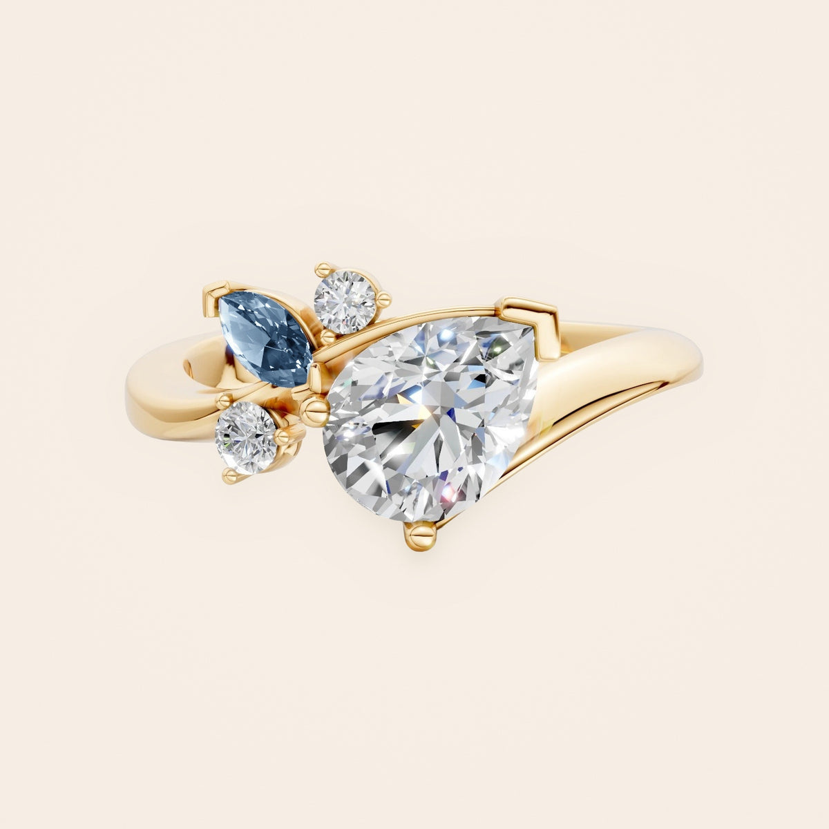 DR0332 diamantring med pæreformet diamant og blå markise i 14 kt. gulguld, forfra