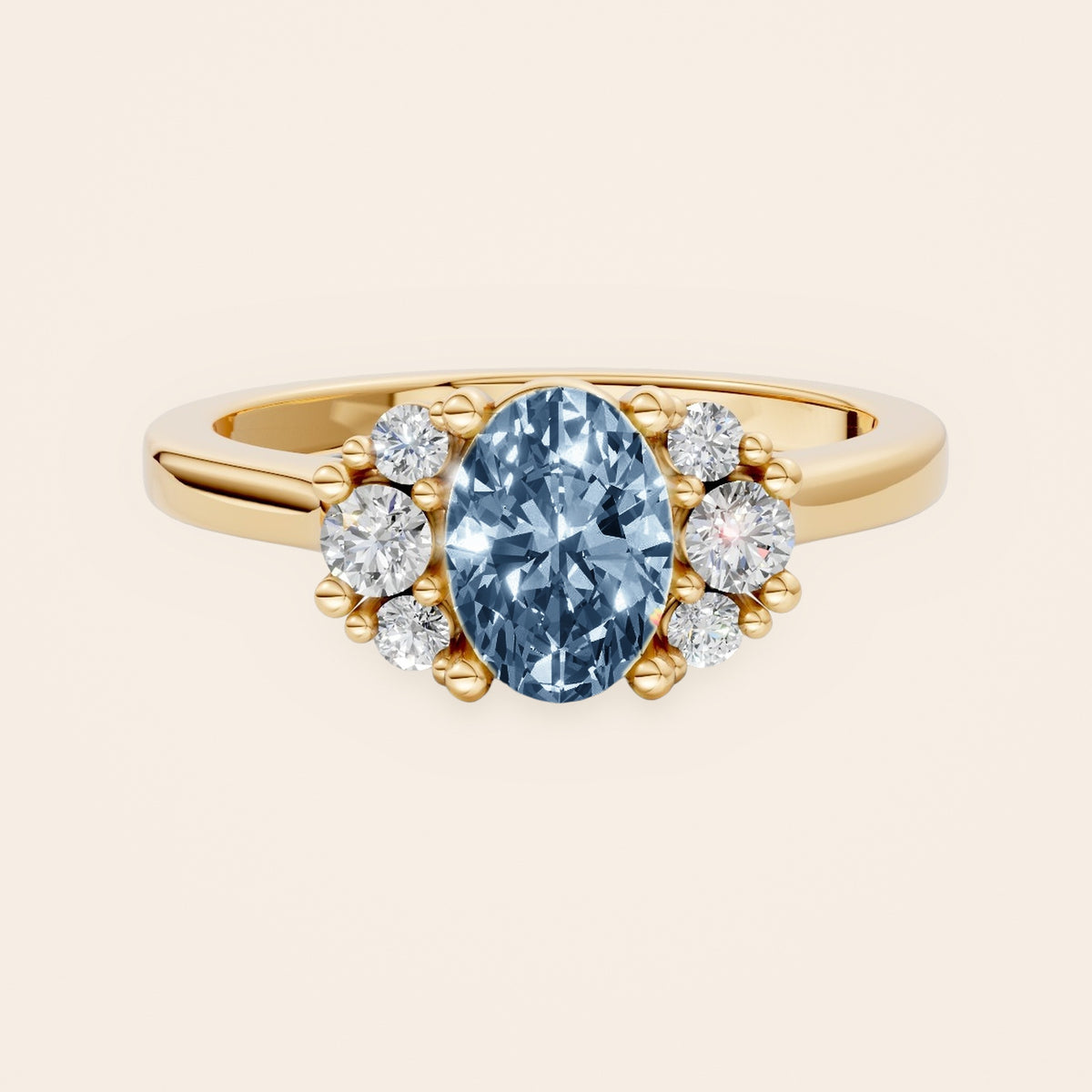 DR0381 diamantring i 14 kt. gulguld med blå oval diamant – forfra