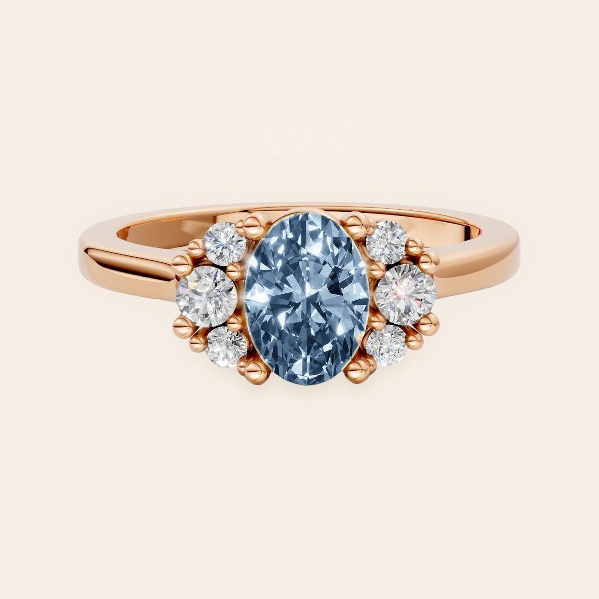 DR0381 diamantring i 14 kt. rosaguld med blå oval diamant – forfra