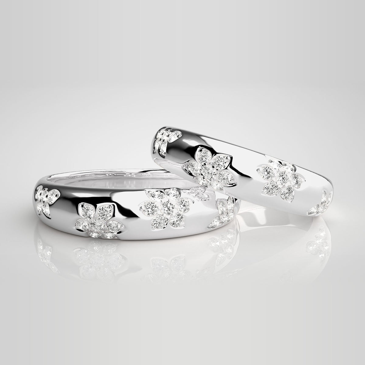 HJ41956 vielsesringe med diamantblomster i 14 kt hvidguld – to ringe side om side