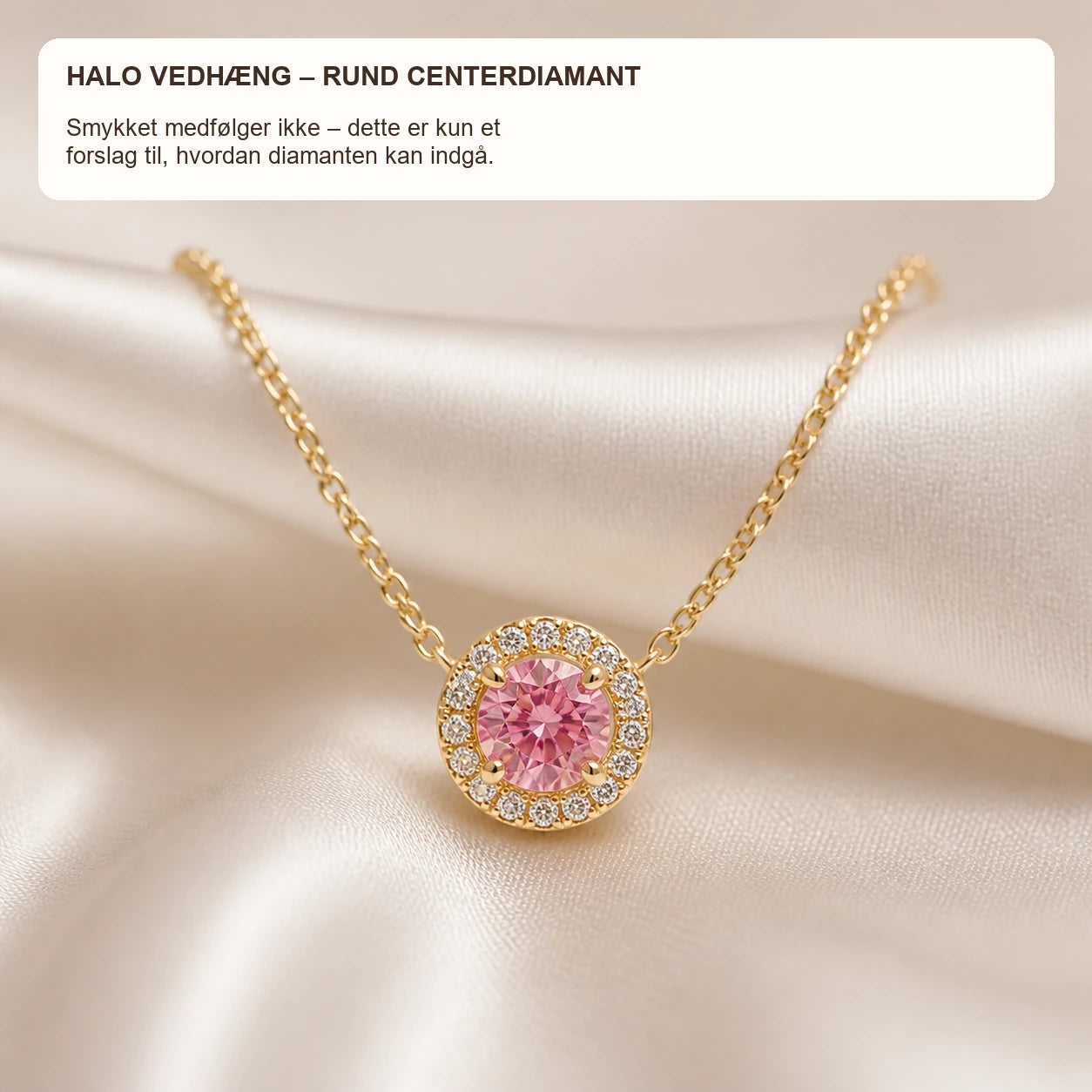 Fancy Vivid Pink lab-grown diamant på 0,10 ct vist som centersten i halo-vedhæng med hvide diamanter i gulguld. Inspirationsbillede — smykket medfølger ikke.