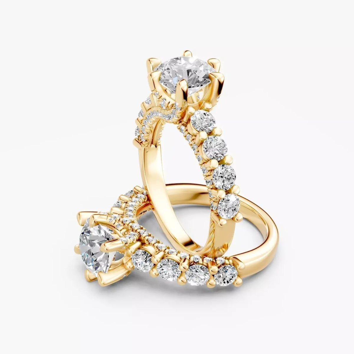 To ZRT039 diamantringe med rund diamant i 14 kt. gulguld