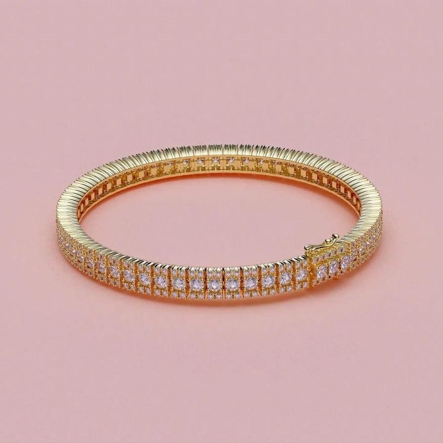 Tennisarmbånd i 18 kt gulguld med 5,50 ct brillanter – studiobillede