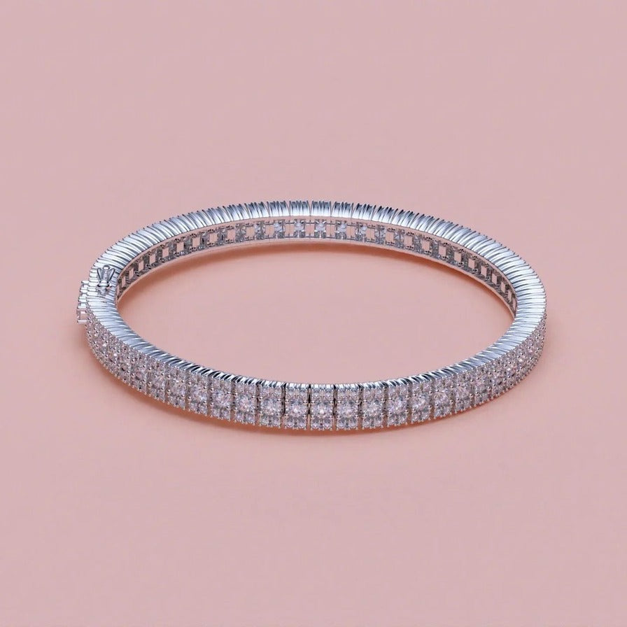 Tennisarmbånd i 18 kt hvidguld med 5,50 ct hvide brillanter fra Manich Jewelry
