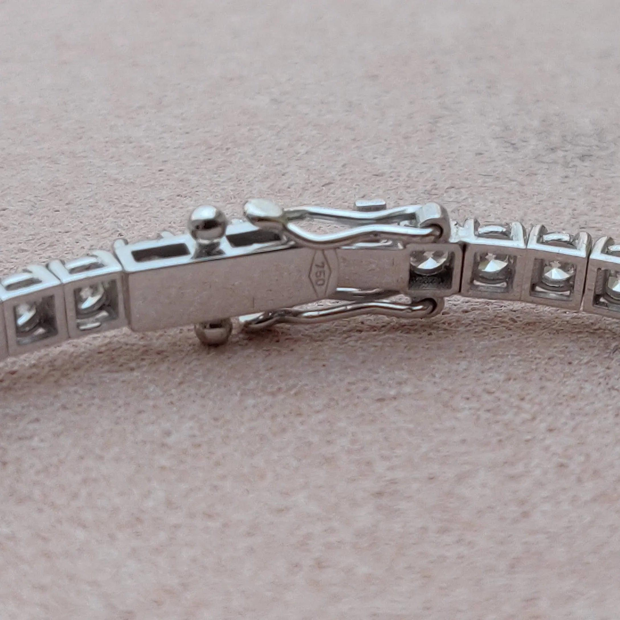 Lås på tennisarmbånd i 18 karat hvidguld med diamanter