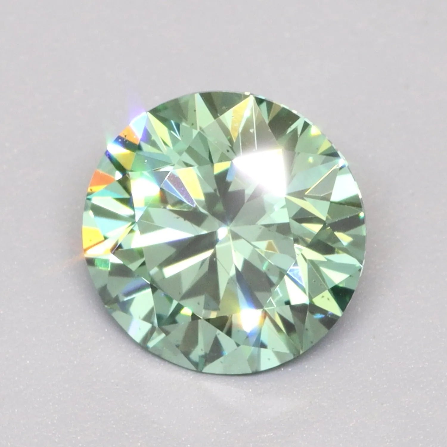 1.07ct Round Lab Grown Diamond (Colour Fancy Vivid Green, Clarity VS2, Cut ID, IGI Certified)
