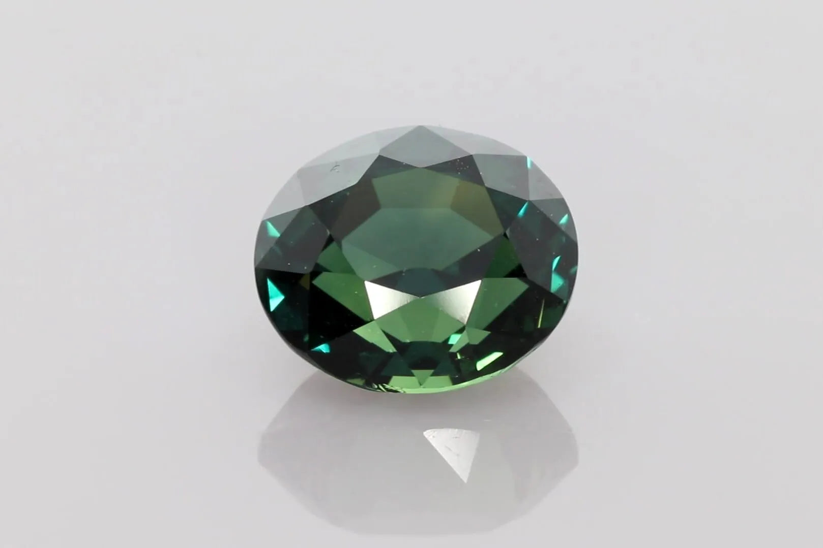 8.29ct Oval Natural Sapphire (Colour Teal, Clarity Eye Clean, Cut Faceted)