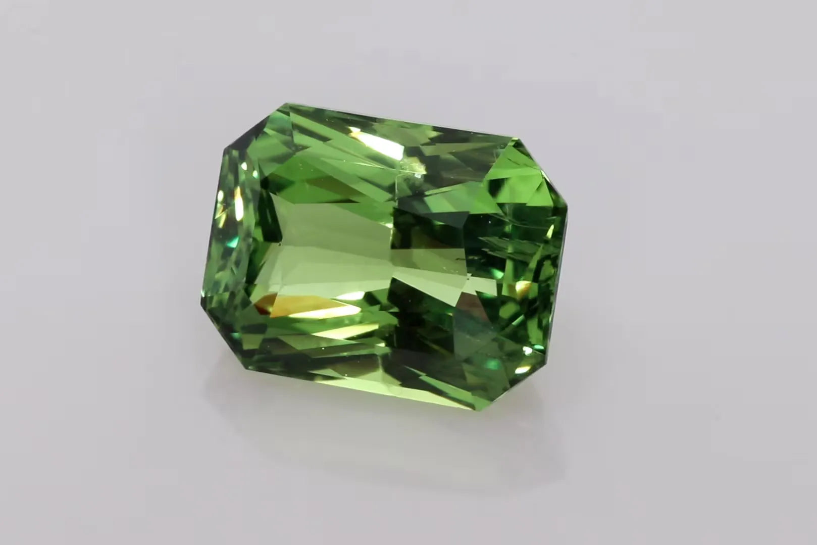 9.72ct Emerald Natural Sapphire (Colour Green, Clarity Slightly Included, Cut Faceted)