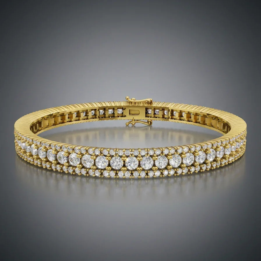 TENNISARMBÅND I 18 KT GULGULD MED 5,50 CT. HVIDE BRILLANTER