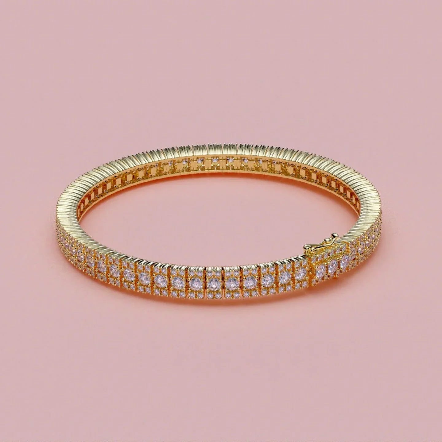 TENNISARMBÅND I 18 KT GULGULD MED 5,50 CT. HVIDE BRILLANTER