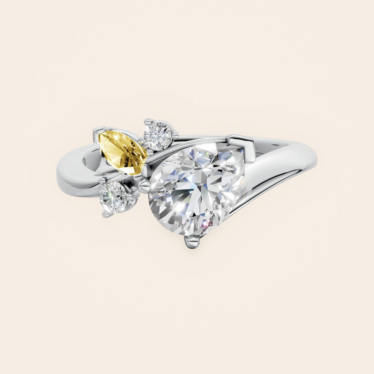 DR0332 diamantring med pæreformet diamant og gul markise i 14 kt. hvidguld, forfra