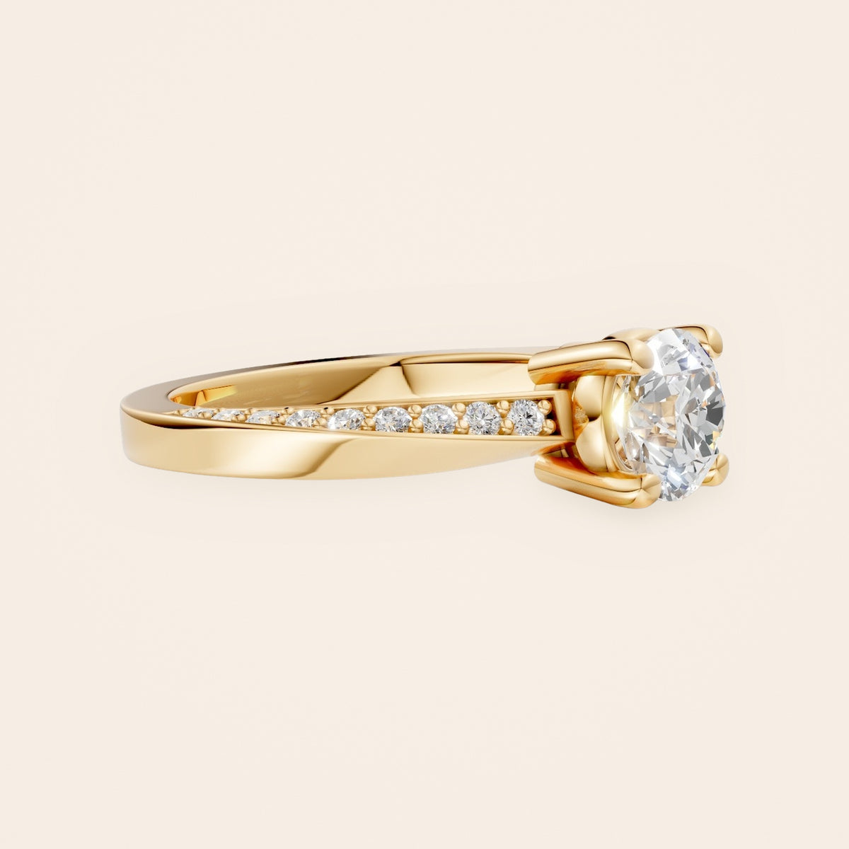 DR0383 solitaire diamantring med snoet pavé-skinne i 14 kt. gulguld – fra siden