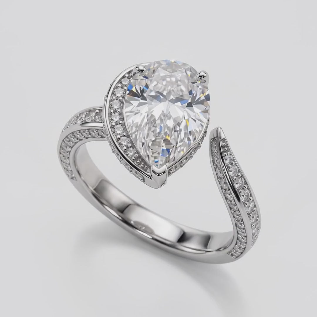 ZLR074 diamantring med dråbeslebet diamant der drejer 360° i hvidguld – video