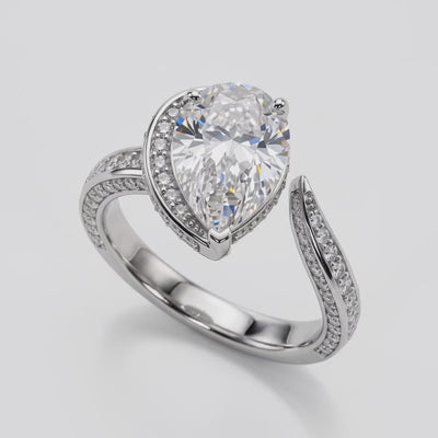 ZLR074 diamantring med dråbeslebet diamant der drejer 360° i hvidguld – video
