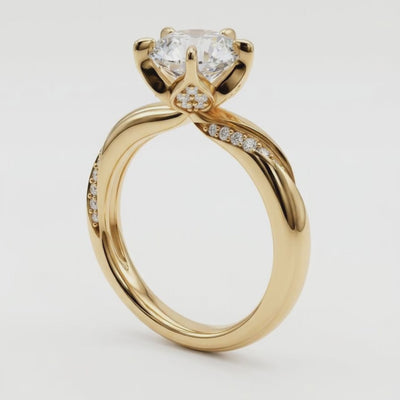 Video af ZFL06 solitaire diamantring med 5 grabber og twist-pavé-skinne i gulguld
