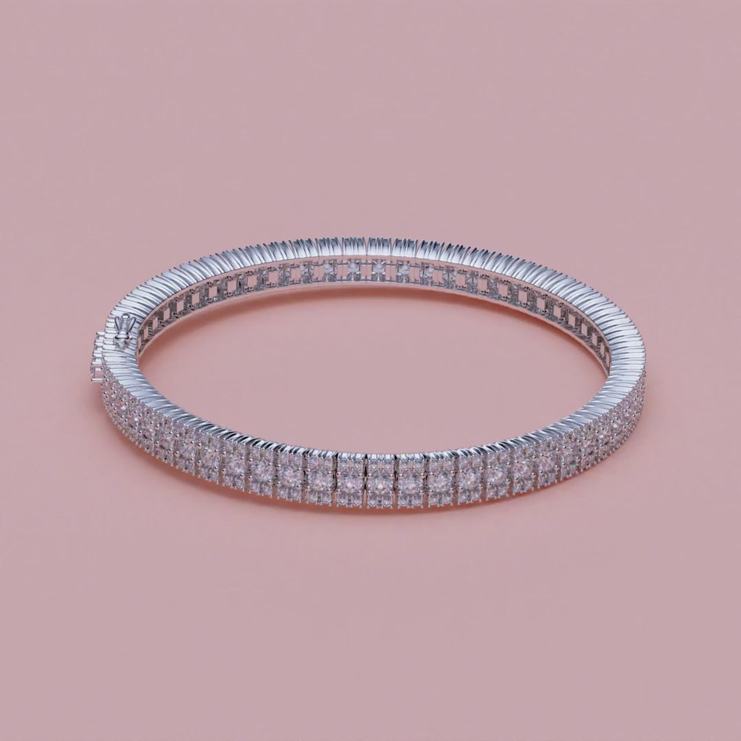 Video af tennisarmbånd i 18 kt hvidguld med 5,50 ct brillanter