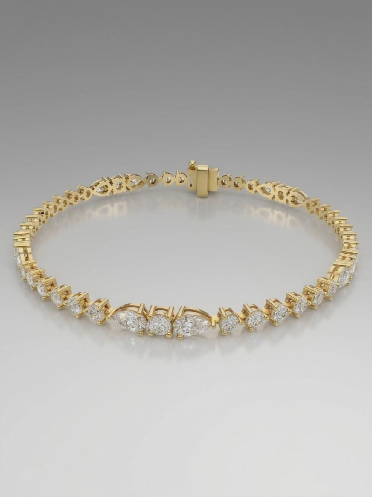 Tennisarmbånd med lab grown diamanter i round og pear cut på i alt 5.32 ct i 14 kt gulguld. Model BR-08.