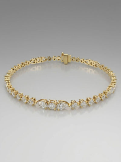 Tennisarmbånd med lab grown diamanter i round og pear cut på i alt 5.32 ct i 14 kt gulguld. Model BR-08.