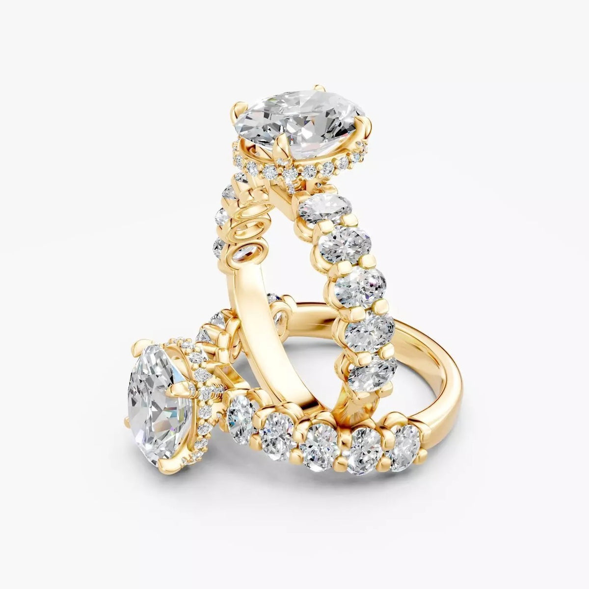 To ZRT034 diamantringe med oval diamant i 14 kt. gulguld